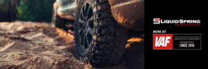 Truck tire on uneven ground with LiquidSpring Logo and now at Vanaxle